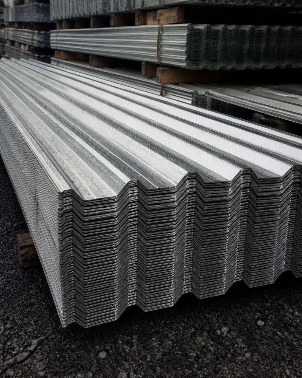 Stacked corrugated metal roofing sheets